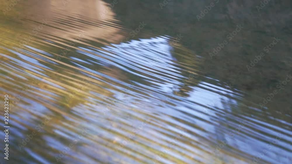 Splash of water. Running water on the rocks. Reflection. Glare. Relaxation Splash of water. Running water on the rocks. Reflection. Glare. Relaxation