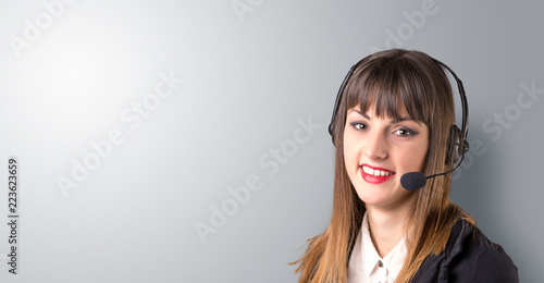 Young female telemarketer on a white background