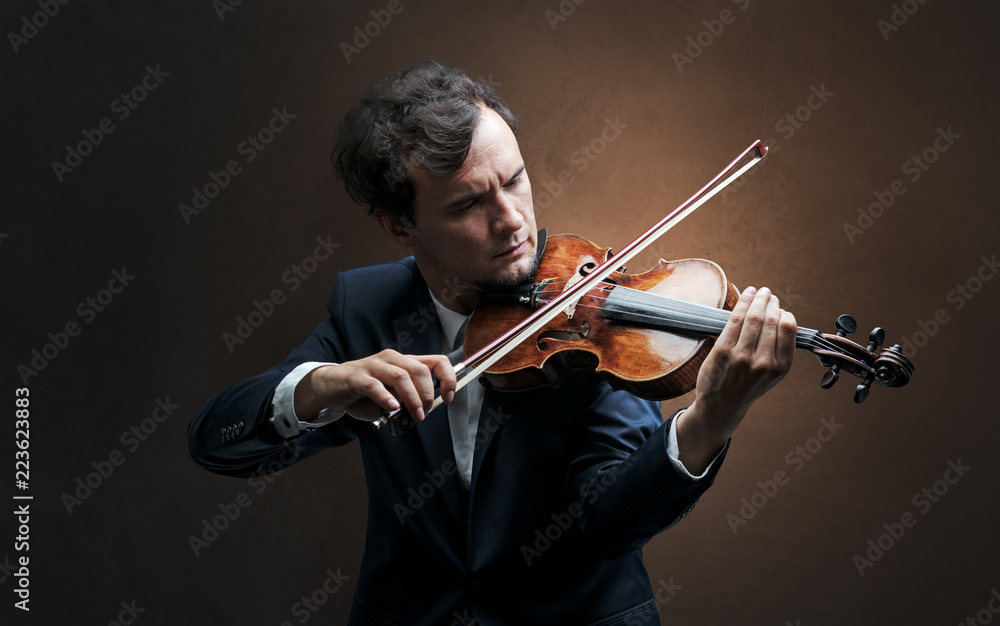 Lonely violinist composing on cello with nothing around
Lonely violinist composing on cello with nothing around