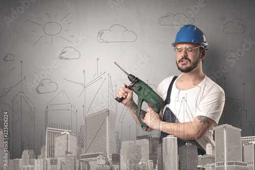 Handyman with tool in his hand and cityscape nearby.