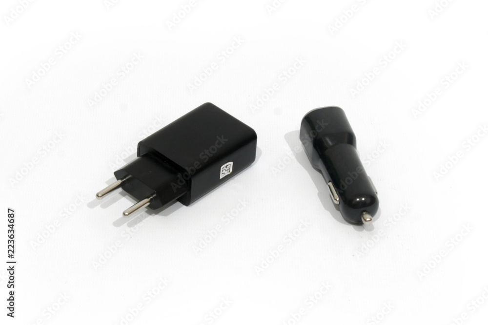 Mobile phone charger and memory card reader isolate on white background Mobile phone charger and memory card reader isolate on white background