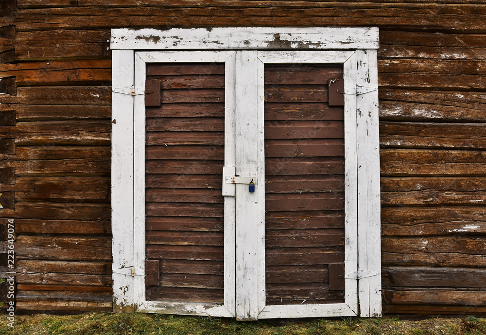Old Brown Double Door and White Door Frame Old Brown Double Door and White Door Frame