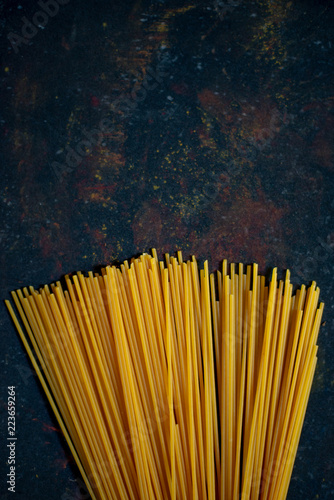Spaghetti on black vintage background