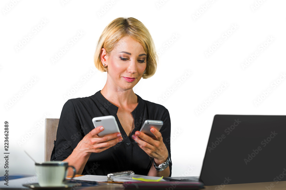 office corporate portrait of young beautiful and happy business woman sitting at laptop computer desk busy with mobile phones confident in job success concept office corporate portrait of young beautiful and happy business woman sitting at laptop computer desk busy with mobile phones confident in job success concept