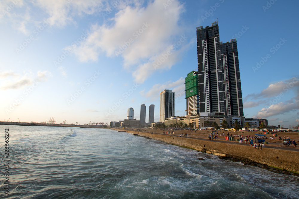 Sunset over cityscape skyline at the Galle Face beachfront urban park area in Colombo Sri Lanka Asia Sunset over cityscape skyline at the Galle Face beachfront urban park area in Colombo Sri Lanka Asia