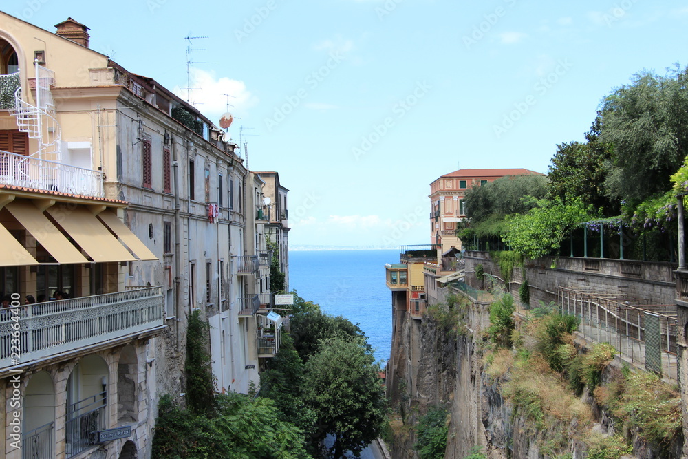 Buildings separated by road below near the main square of Sorrento, Italy