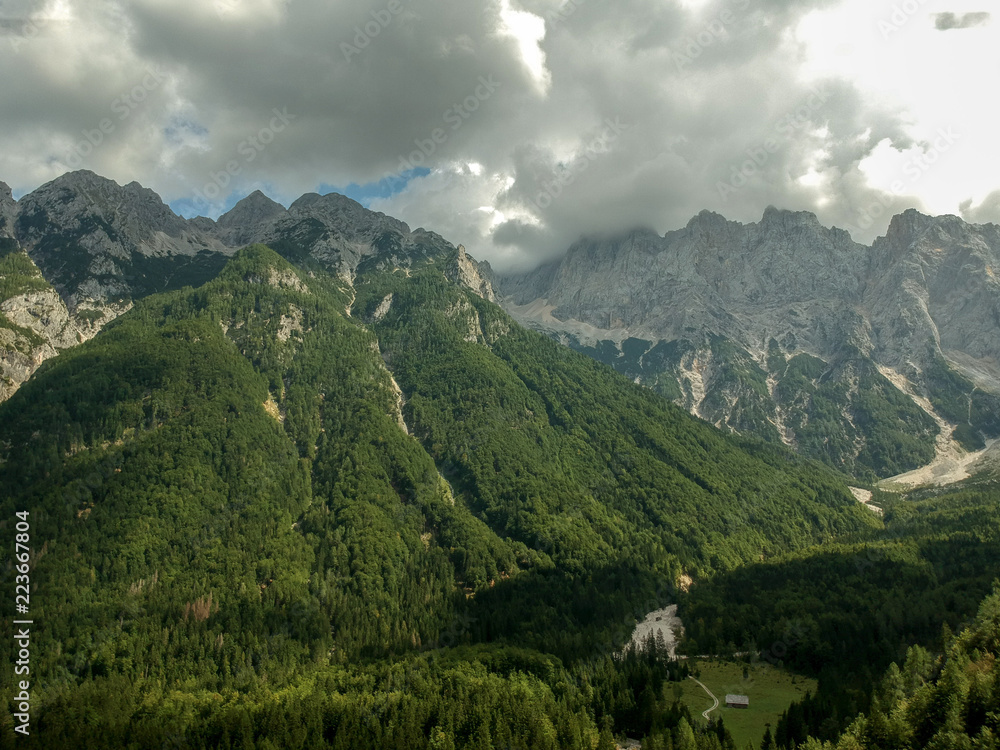 Aerial view of beautiful Triglav mountains, part of Alps in Slovenia. Beautiful clouds on top of mountains.
