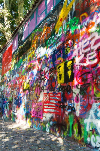 Famous John Lennon Wall covered with graffiti in the Little Town area near Charles Bridge, Mala Strana, Prague, Czech Republic photo