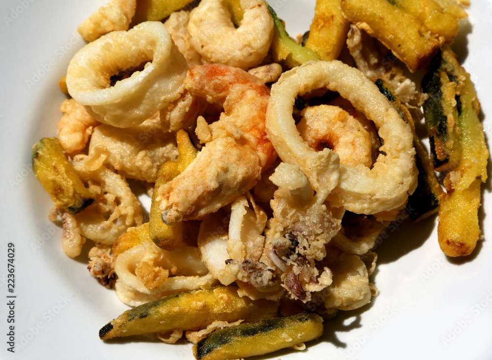 deep fry fish and battered vegetables Photos Adobe Stock