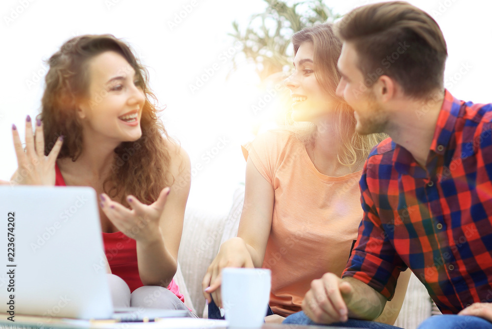 group of students to discuss the problem sitting on the couch. group of students to discuss the problem sitting on the couch.