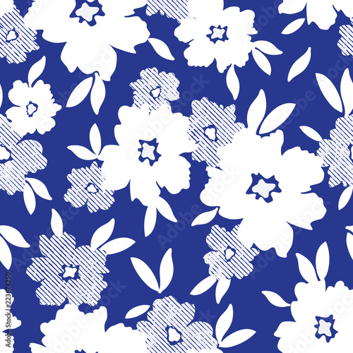 White minimalistic flowers scattered on blue background vector seamless pattern