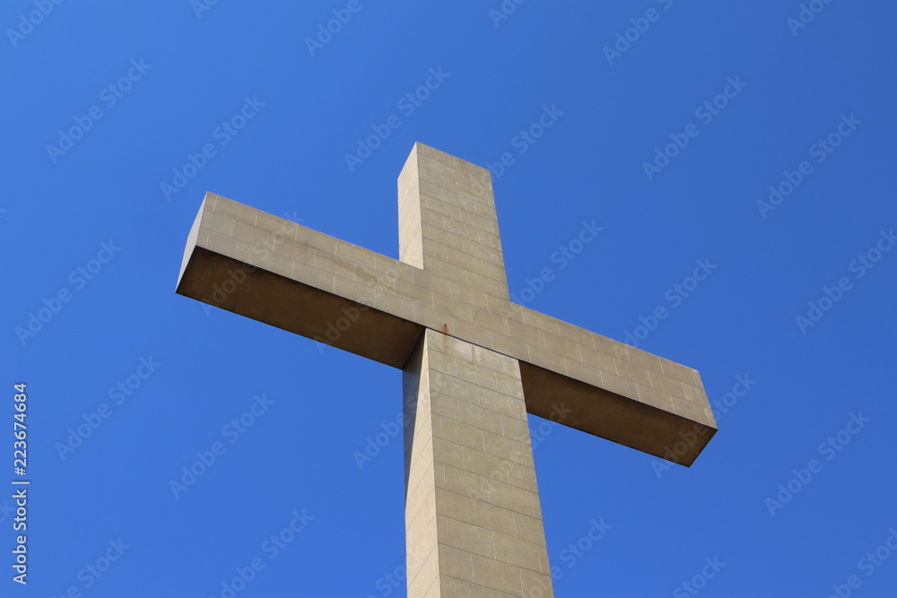Large Cross on Blue Sky Background 