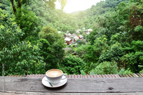 morning coffee on the wooden balcony in the hidden village of Mae Kampong, Chiang Mai, full of nature and refreshment