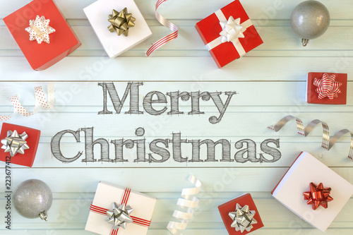 Red and white gift boxes are arranged in a circle. In the center of the blue background is the inscription of Merry Christmas.