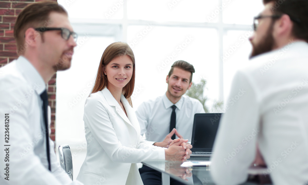 close up.business team sitting at the Desk close up.business team sitting at the Desk