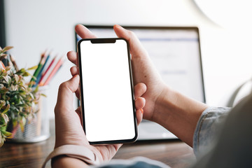 woman using Smartphone. Blank screen mobile phone for graphic display montage.networking service.