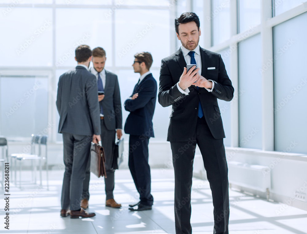 businessman reading text message on smartphone businessman reading text message on smartphone