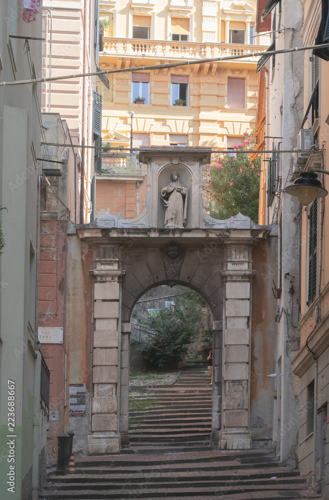 stairway in an ancient quarter of Genoa through an arch to reach the palaces. Italian architecture,Italy