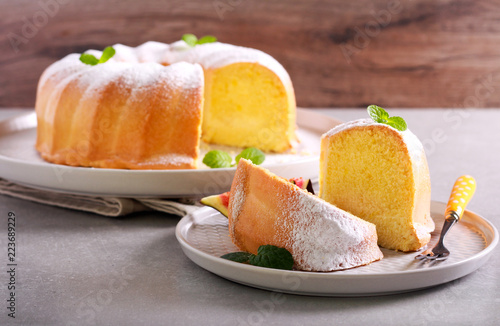 Photography Lemon sponge ring cake with icing sugar