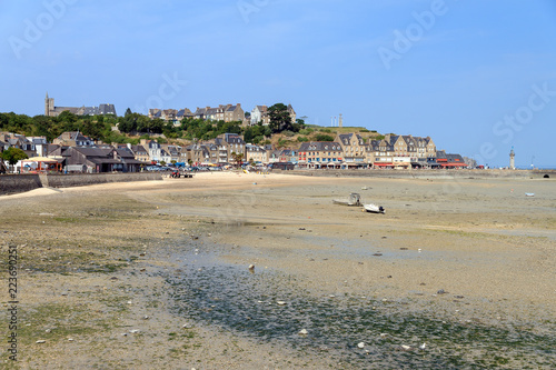 Beautiful cityscape view of the skyline and beach at low tide of the city Cancale, France, in summer 