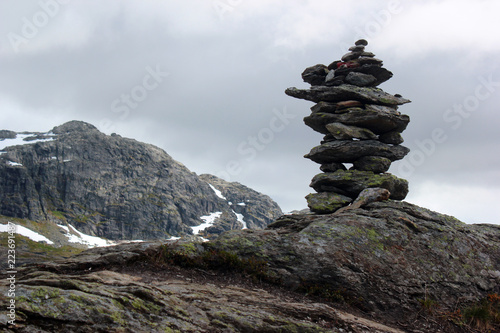Stone cairn on a way to Trolltunga, Norway © aquatarkus