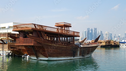 Boat in front of the Sky Line of Qatar