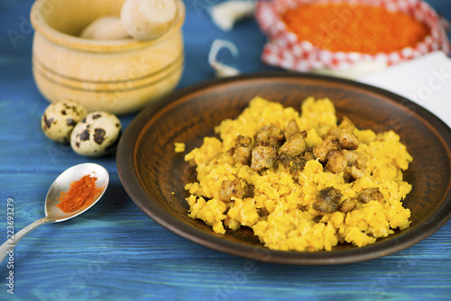 porridge of lentils with fried meat on a plate photo