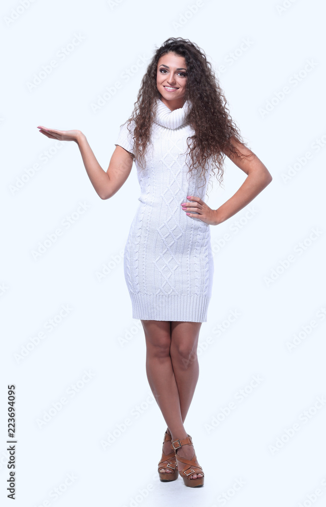 Smiling woman pointing finger at copy space. Smiling woman pointing finger at copy space.