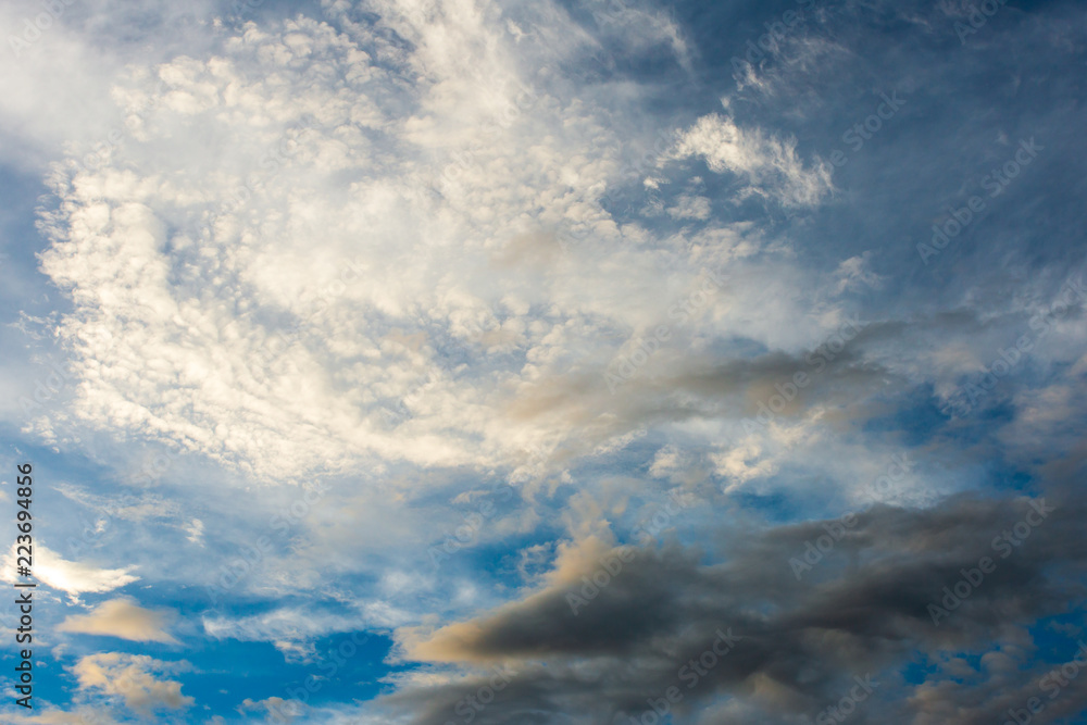 colorful dramatic sky with cloud at sunset.