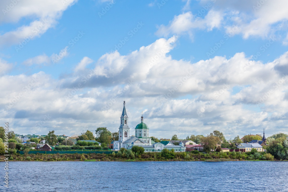 St. Catherine's convent. Russia, the city Tver. View of the monastery from the Volga river. Picturesque clouds in the sky. Summer or autumn day.