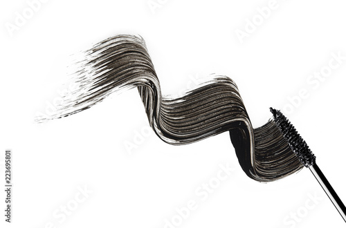 black mascara design wave drawing on white background with brush
