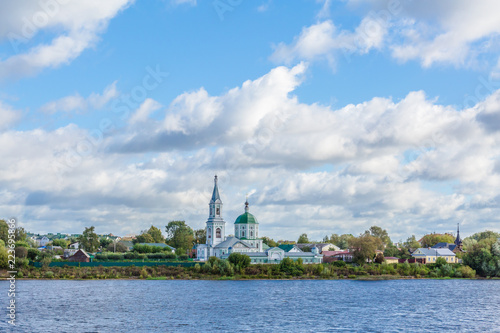 St. Catherine's convent. Russia, the city Tver. View of the monastery from the Volga river. Picturesque clouds in the sky. Summer or autumn day. © Andrey Lapshin