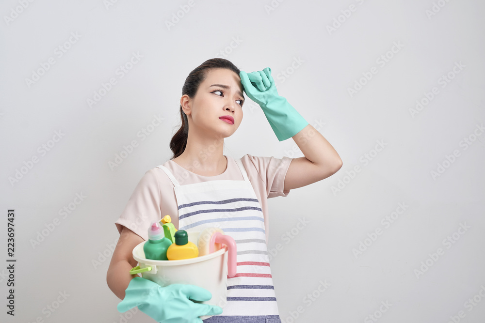Young housewife is tired of cleaning,Exhausted housewife Young housewife is tired of cleaning,Exhausted housewife