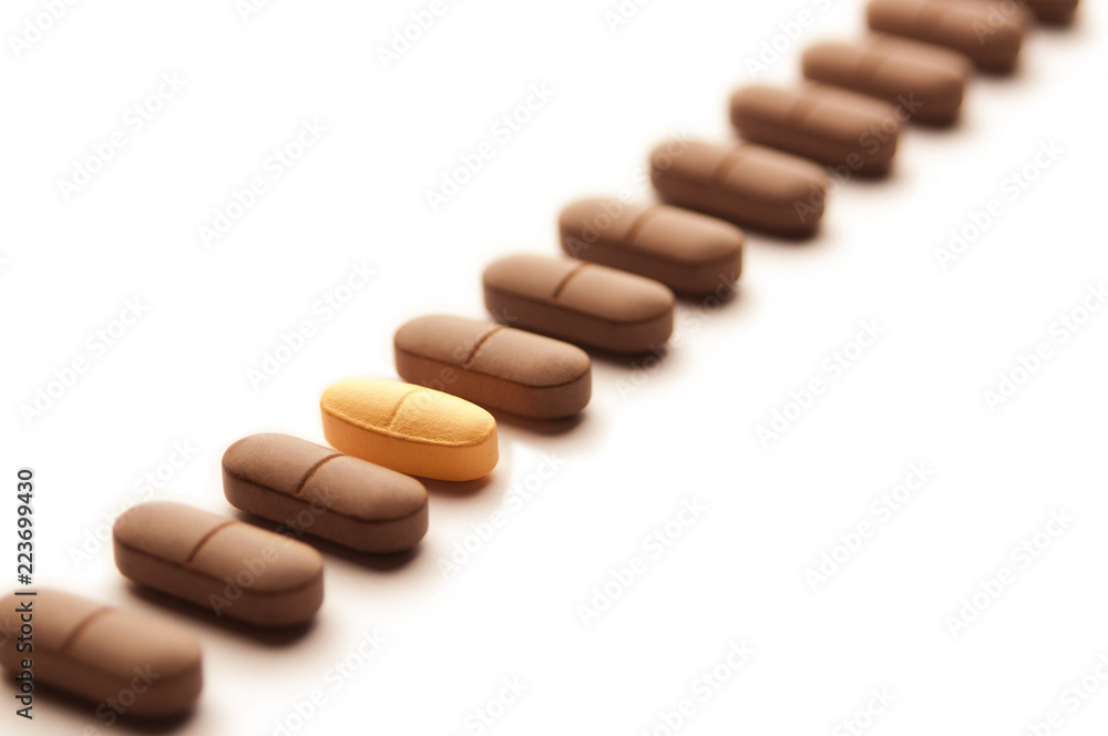 Medical pills in a row close up Medical pills in a row close up