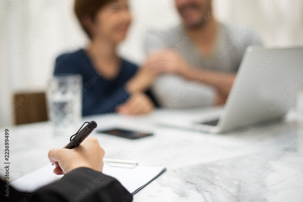 Young man and woman planning with professional consultant. Young man and woman planning with professional consultant.