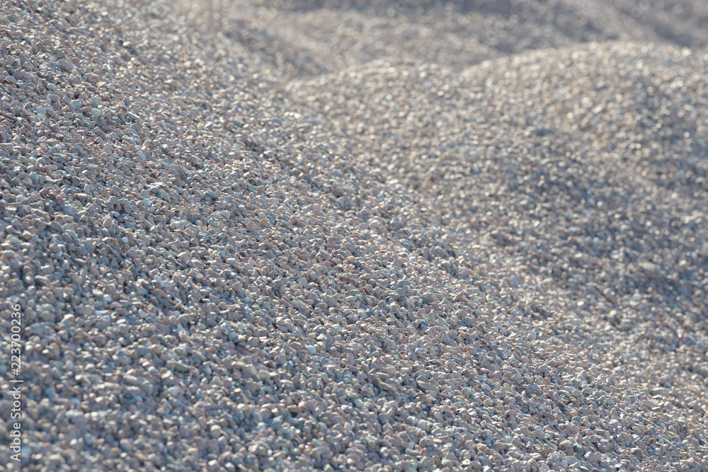Breakstone background. Road gravel. Gravel texture. Crushed Gravel background. Piles of limestone rocks. Break stones on construction site. Breakstone background. Road gravel. Gravel texture. Crushed Gravel background. Piles of limestone rocks. Break stones on construction site.