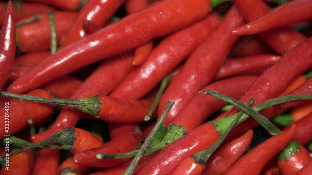 Many Red Chili Peppers Rotating Many Red Chili Peppers Rotating