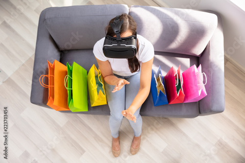 Woman Doing Shopping With Virtual Reality Glasses