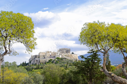 Greece, Acropolis of Athens view from Pnyx hill between pine trees