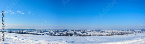 Amazing panorama of the Ukrainian village in western Ukraine in winter © niko_cingaryuk