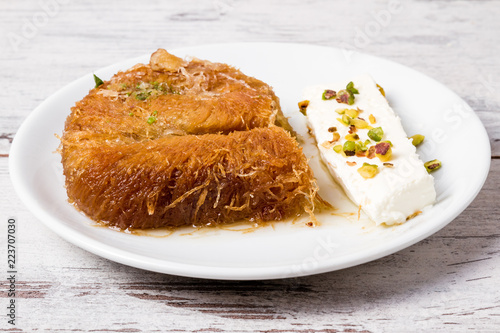 Turkish Style Sweet Creamy Pastry, Kadayif in White Plate photo