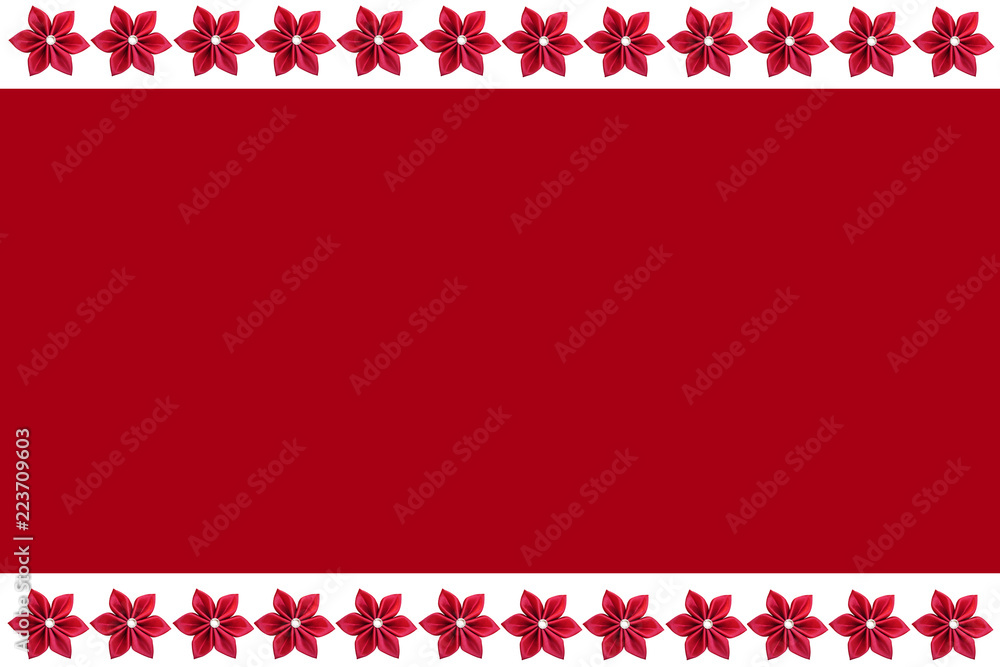 Red Christmas background with borders made of red poinsettia flowers Red Christmas background with borders made of red poinsettia flowers