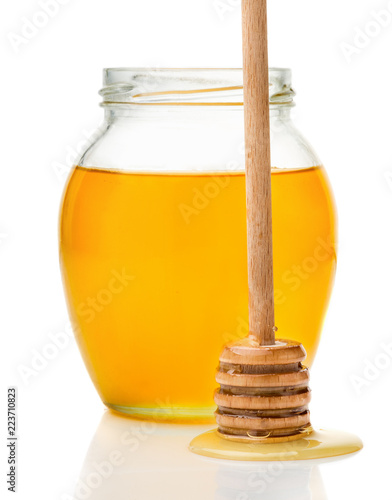 Natural honey in a glass ja