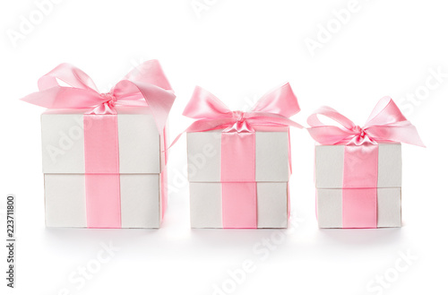Gift boxes with pink satin ribbon