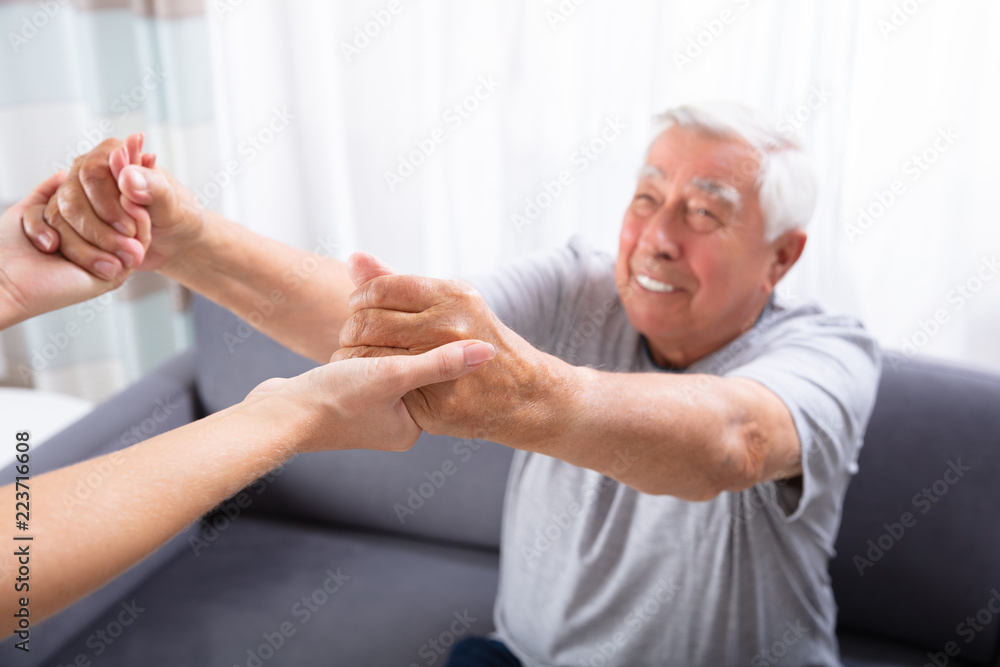 Obraz premium Daughter Holding Hands Of Her Father