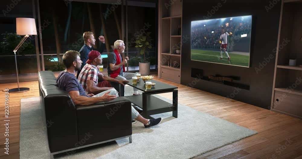 Group of fans are watching a soccer moment on the TV and celebrating a goal, sitting on the couch in the living room. The living room is made in 3D.