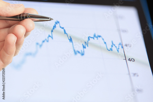Double exposure image of charts on technology financial graph background.