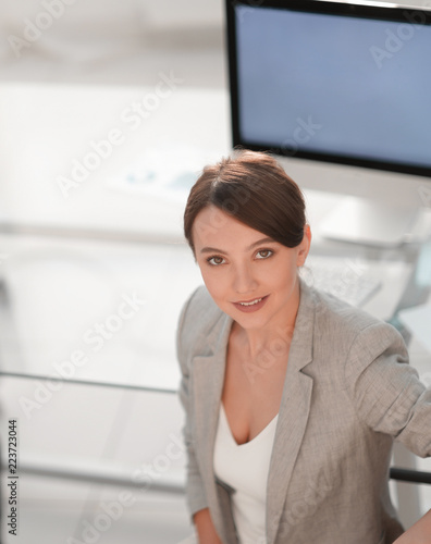 view from the top. two women colleagues sitting near the desktop Free Download view from the top. two women colleagues sitting near the desktop - GFXLoad
