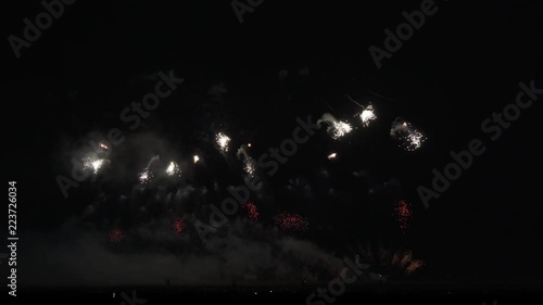 Colorful fireworks on black sky background stock footage video