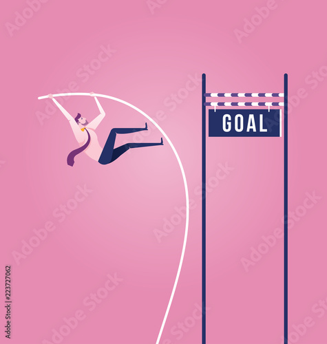 Businessman doing pole vaulting for jumping the goal